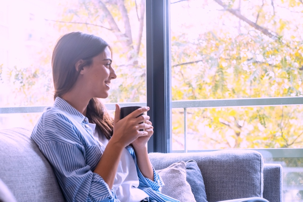 Female having a hot beverage while wondering what to expect from outpatient drug rehab in Alpharetta