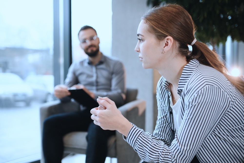 Woman in outpatient mental health treatment